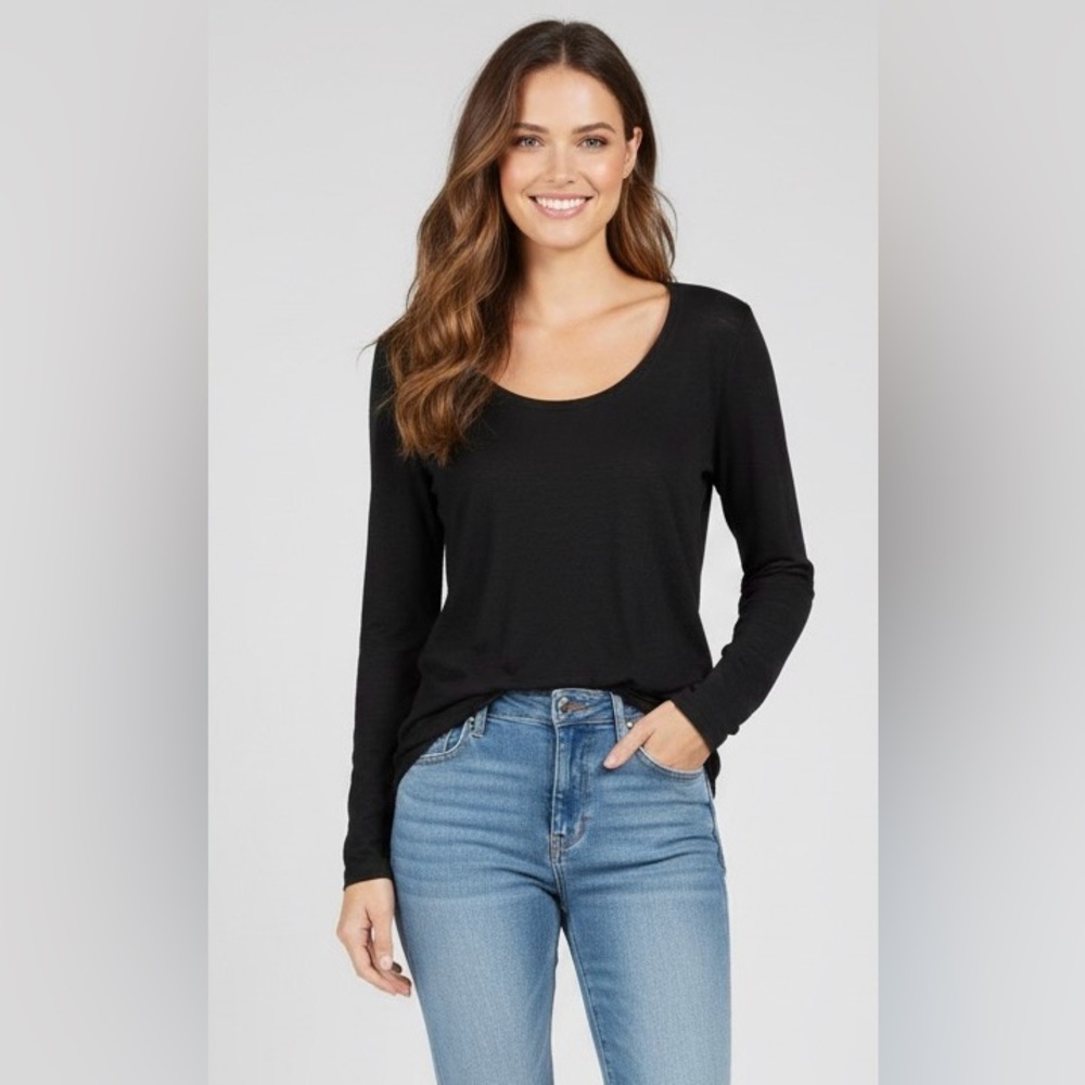 Michael Kors black, long sleeved blouse, round neck, Small but loose fit.